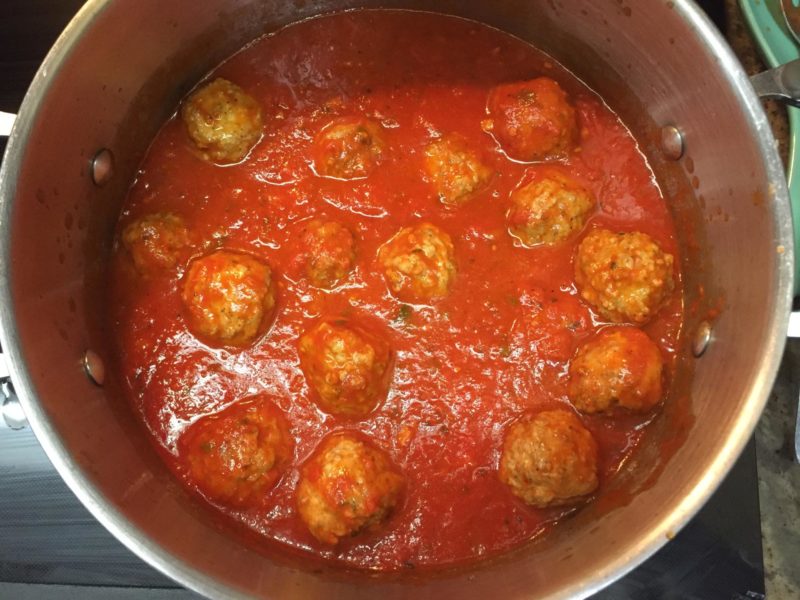 meatballs simmering